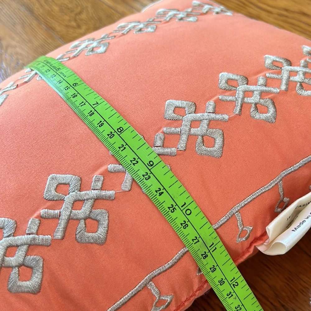 Jessica Simpson accent pillow.  Orange w/tan embroidery on one side.  12”x16.5”